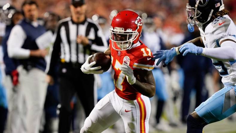 Nov 6, 2022; Kansas City, Missouri, USA; Kansas City Chiefs wide receiver Mecole Hardman (17) races past Tennessee Titans cornerback Terrance Mitchell (39) during the second quarter  at GEHA Field at Arrowhead Stadium. Mandatory Credit: George Walker IV / Tennessean.com