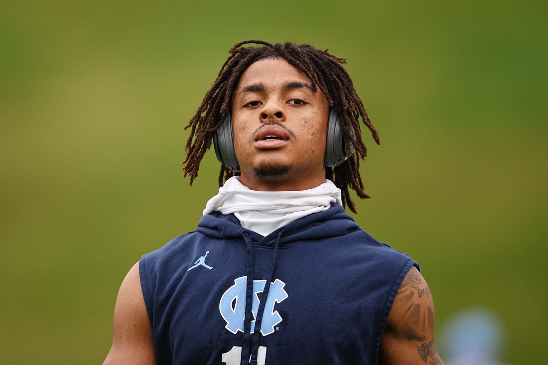 Nov 5, 2022; Charlottesville, Virginia, USA; North Carolina Tar Heels wide receiver Josh Downs (11) looks on before the game against the North Carolina Tar Heels at Scott Stadium. Mandatory Credit: Scott Taetsch-USA TODAY Sports