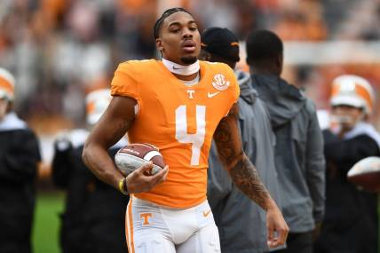 Tennessee wide receiver Cedric Tillman (4) carries the ball he was presented during a pregame ceremony recognizing the team seniors before the start of the NCAA college football game against Missouri on Saturday, November 12, 2022 in Knoxville, Tenn.

Ut Vs Missouri