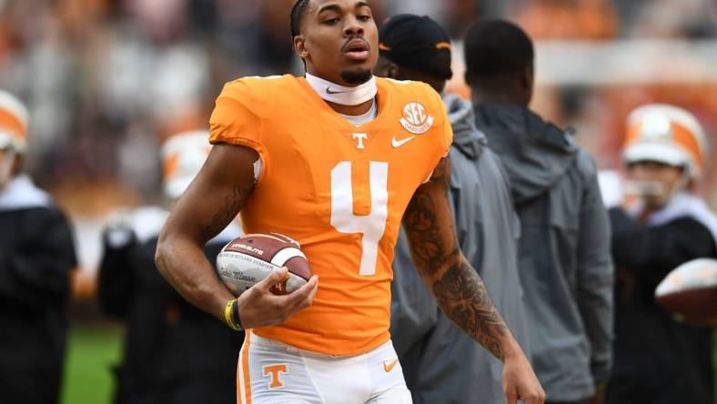 Tennessee wide receiver Cedric Tillman (4) carries the ball he was presented during a pregame ceremony recognizing the team seniors before the start of the NCAA college football game against Missouri on Saturday, November 12, 2022 in Knoxville, Tenn.

Ut Vs Missouri