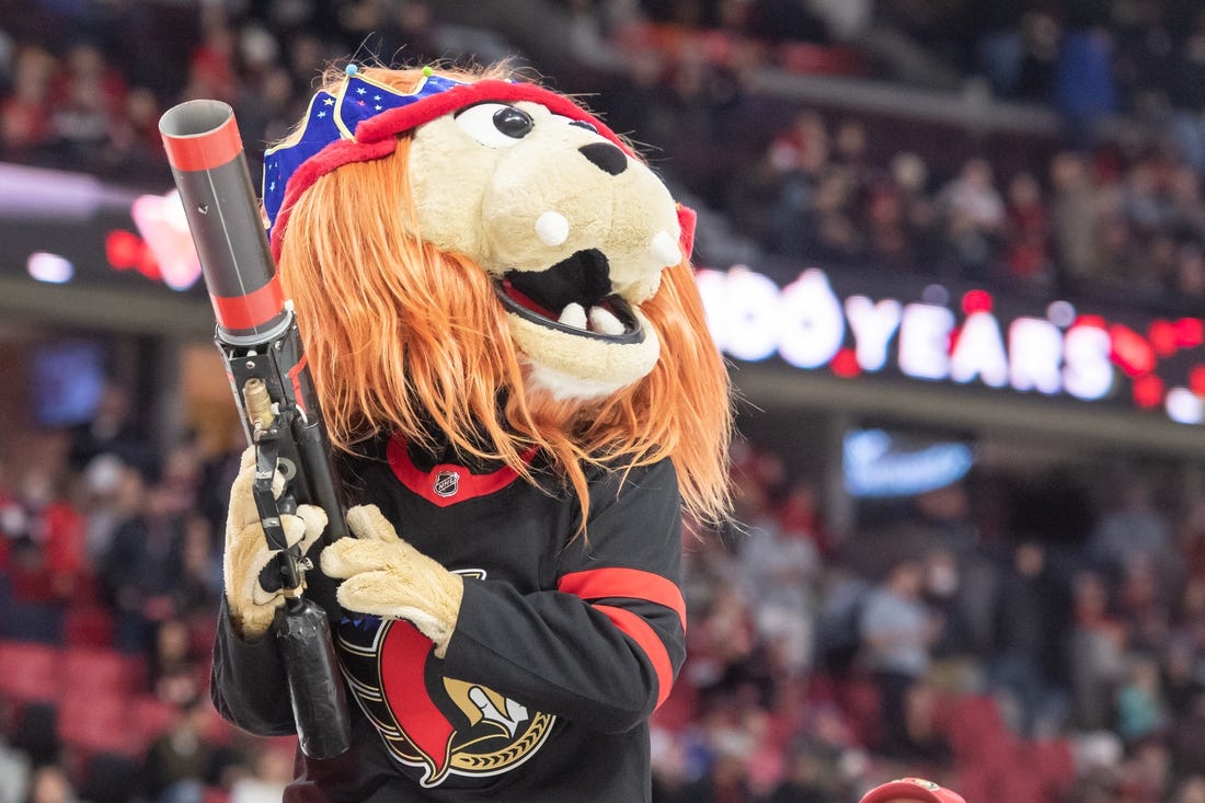 Nov 19, 2022; Ottawa, Ontario, CAN; Spartacat celebrates his birthday during game between the New Jersey Devils and the Ottawa Senators at the Canadian Tire Centre. Mandatory Credit: Marc DesRosiers-USA TODAY Sports