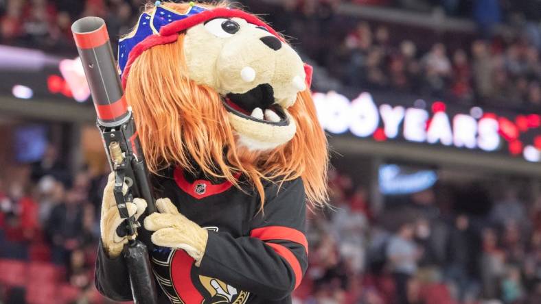 Nov 19, 2022; Ottawa, Ontario, CAN; Spartacat celebrates his birthday during game between the New Jersey Devils and the Ottawa Senators at the Canadian Tire Centre. Mandatory Credit: Marc DesRosiers-USA TODAY Sports