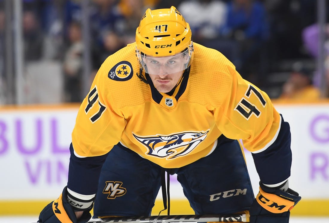 Nov 19, 2022; Nashville, Tennessee, USA; Nashville Predators right wing Michael McCarron (47) waits for a face off against the Tampa Bay Lightning during the first period at Bridgestone Arena. Mandatory Credit: Christopher Hanewinckel-USA TODAY Sports