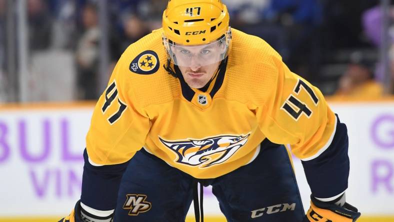 Nov 19, 2022; Nashville, Tennessee, USA; Nashville Predators right wing Michael McCarron (47) waits for a face off against the Tampa Bay Lightning during the first period at Bridgestone Arena. Mandatory Credit: Christopher Hanewinckel-USA TODAY Sports