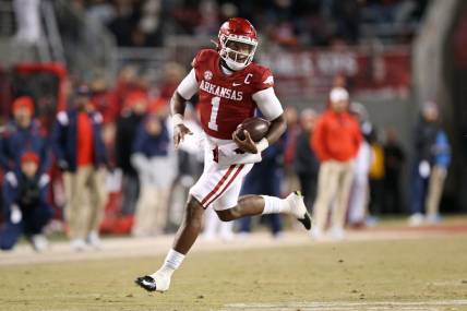 Nov 19, 2022; Fayetteville, Arkansas, USA; Arkansas Razorbacks quarterback KJ Jefferson (1) rushes in the second quarter against the Ole Miss Rebels at Donald W. Reynolds Razorback Stadium. Mandatory Credit: Nelson Chenault-USA TODAY Sports