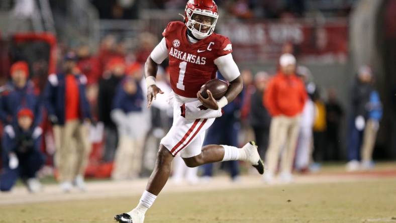 Nov 19, 2022; Fayetteville, Arkansas, USA; Arkansas Razorbacks quarterback KJ Jefferson (1) rushes in the second quarter against the Ole Miss Rebels at Donald W. Reynolds Razorback Stadium. Mandatory Credit: Nelson Chenault-USA TODAY Sports