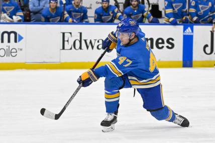 Nov 19, 2022; St. Louis, Missouri, USA;  St. Louis Blues defenseman Torey Krug (47) shoots and scores against the Anaheim Ducks during the second period at Enterprise Center. Mandatory Credit: Jeff Curry-USA TODAY Sports