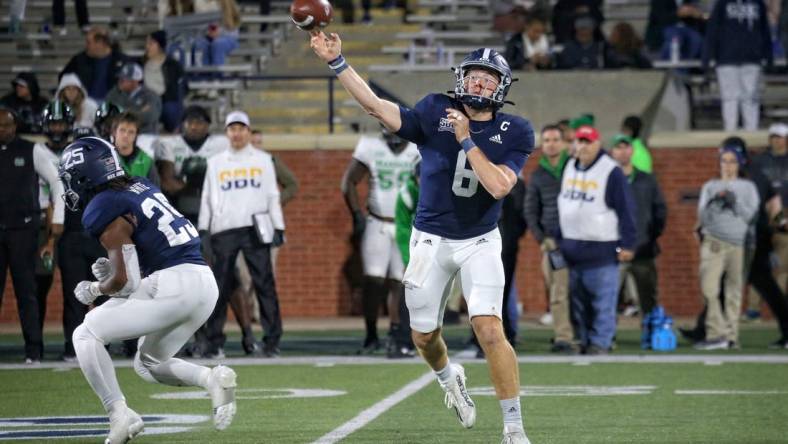 Georgia Southern quarterback Kyle Vantrease (6) passes while running back Jalen Whitehurst says in to block against Marshall.

Gasovsmarshallffortunesmn202230