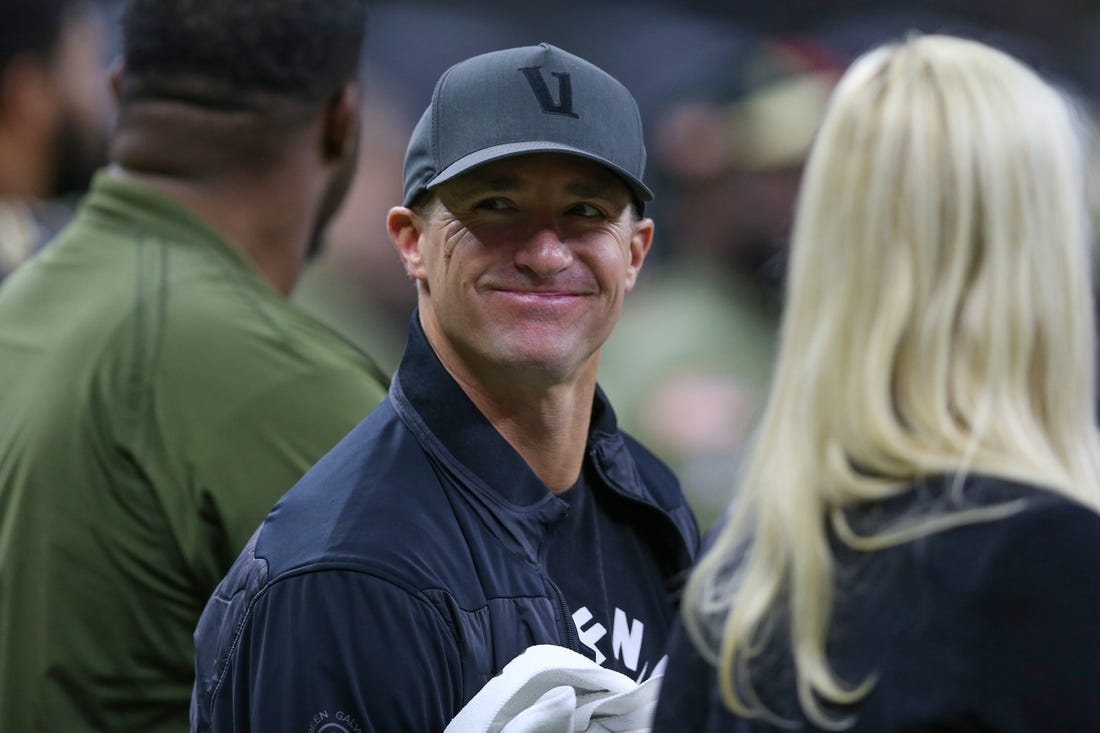 Nov 20, 2022; New Orleans, Louisiana, USA; Former New Orleans Saints quarterback Drew Brees on the sidelines in the first quarter of the game between the New Orleans Saints and the Los Angeles Rams at the Caesars Superdome. Mandatory Credit: Chuck Cook-USA TODAY Sports