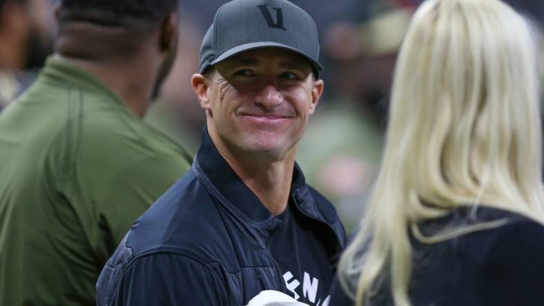 Nov 20, 2022; New Orleans, Louisiana, USA; Former New Orleans Saints quarterback Drew Brees on the sidelines in the first quarter of the game between the New Orleans Saints and the Los Angeles Rams at the Caesars Superdome. Mandatory Credit: Chuck Cook-USA TODAY Sports