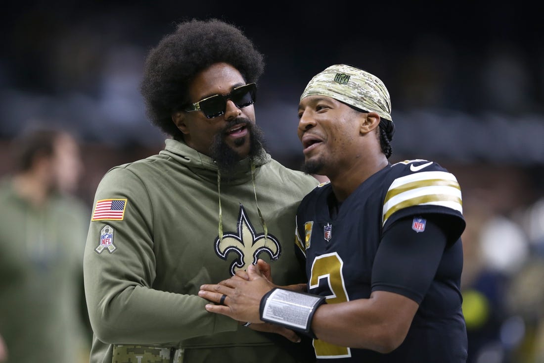 Nov 20, 2022; New Orleans, Louisiana, USA; Injured New Orleans Saints defensive end Cameron Jordan walks off the field with quarterback Jameis Winston (2) at the end of their game against the Los Angeles Rams at the Caesars Superdome. Mandatory Credit: Chuck Cook-USA TODAY Sports