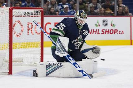 Nov 21, 2022; Vancouver, British Columbia, CAN; Vancouver Canucks goalie Thatcher Demko (35) makes a save against the Vegas Golden Knights in the second period at Rogers Arena. Mandatory Credit: Bob Frid-USA TODAY Sports