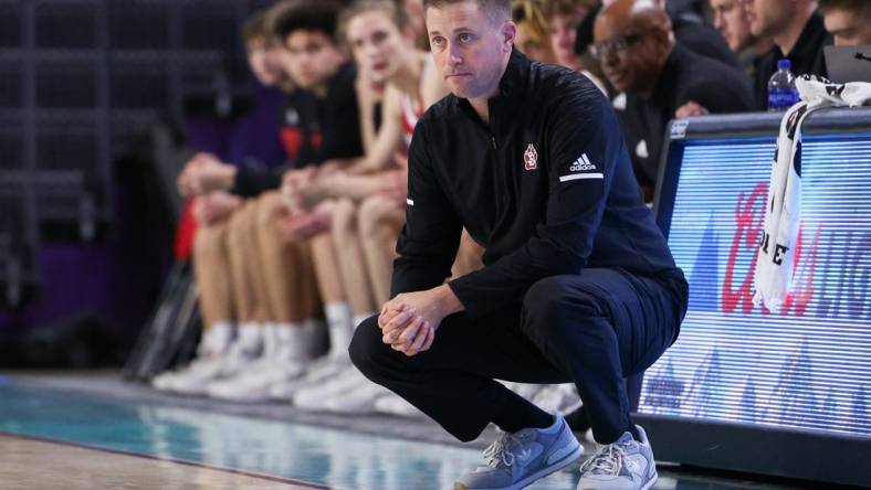 Nov 22, 2022; Fort Myers, Florida, USA;  South Dakota Coyotes head coach Eric Peterson looks on in the second half against Long Island University during the Fort Myers Tip-Off at Suncoast Credit Union Arena. Mandatory Credit: Nathan Ray Seebeck-USA TODAY Sports