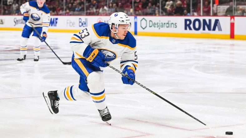 Nov 22, 2022; Montreal, Quebec, CAN; Buffalo Sabres left wing Jeff Skinner (53) reaches out for the puck against the Montreal Canadiens during the second period at Bell Centre. Mandatory Credit: David Kirouac-USA TODAY Sports