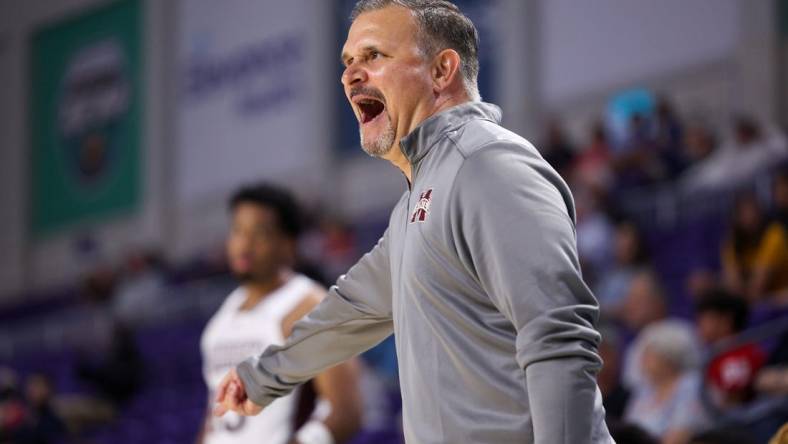 Nov 23, 2022; Fort Myers, Florida, USA;  Mississippi State Bulldogs head coach Chris Jans calls a play against the Utah Utes in the first half during the Fort Myers Tip-Off Beach Division championship game at Suncoast Credit Union Arena. Mandatory Credit: Nathan Ray Seebeck-USA TODAY Sports