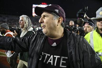Nov 24, 2022; Oxford, Mississippi, USA; Mississippi State Bulldogs coach Mike Leach walks onto the field  after the game against the Ole Miss Rebels at Vaught-Hemingway Stadium. Mandatory Credit: Matt Bush-USA TODAY Sports