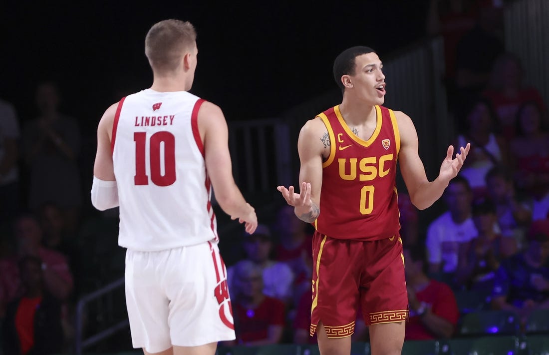 Nov 25, 2022; Paradise Island, BAHAMAS; USC Trojans forward Kobe Johnson (0) reacts in front of Wisconsin Badgers guard Isaac Lindsey (10) during the second half at Imperial Arena. Mandatory Credit: Kevin Jairaj-USA TODAY Sports