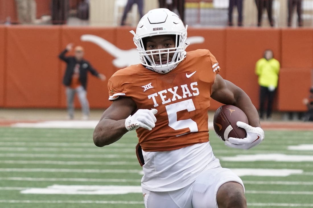 Nov 25, 2022; Austin, Texas, USA; Texas Longhorns running back Bijan Robinson (5) runs during the second half against the Baylor Bears at Darrell K Royal-Texas Memorial Stadium. Mandatory Credit: Scott Wachter-USA TODAY Sports