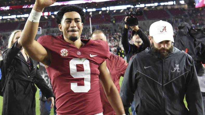 Nov 26, 2022; Tuscaloosa, Alabama, USA;  Alabama Crimson Tide quarterback Bryce Young (9) waves to fans as he leaves the field after defeating the Auburn Tigers at Bryant-Denny Stadium. Alabama won 49-27. Mandatory Credit: Gary Cosby Jr.-USA TODAY Sports