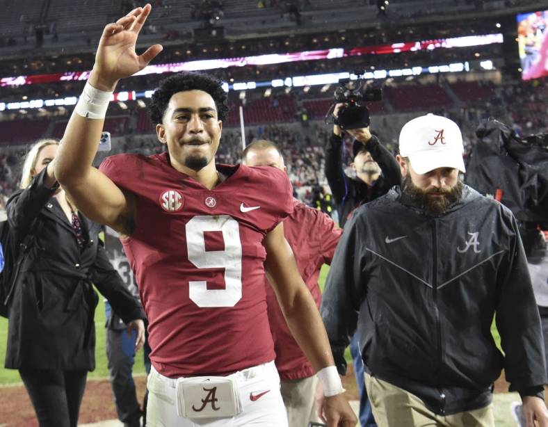 Nov 26, 2022; Tuscaloosa, Alabama, USA;  Alabama Crimson Tide quarterback Bryce Young (9) waves to fans as he leaves the field after defeating the Auburn Tigers at Bryant-Denny Stadium. Alabama won 49-27. Mandatory Credit: Gary Cosby Jr.-USA TODAY Sports