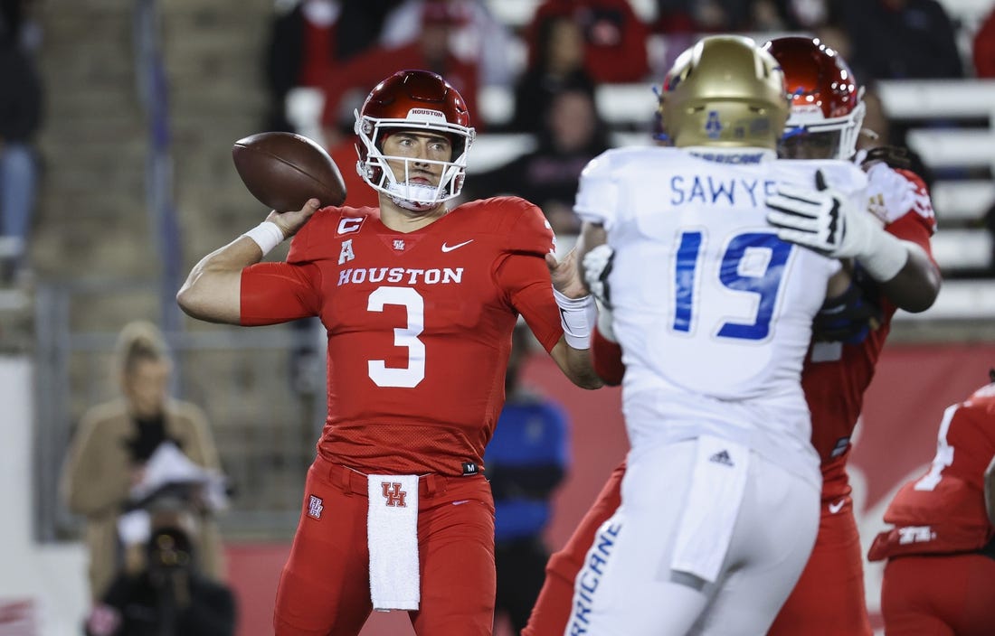 Nov 26, 2022; Houston, Texas, USA; Houston Cougars quarterback Clayton Tune (3) attempts a pass during the first quarter against the Tulsa Golden Hurricane at TDECU Stadium. Mandatory Credit: Troy Taormina-USA TODAY Sports