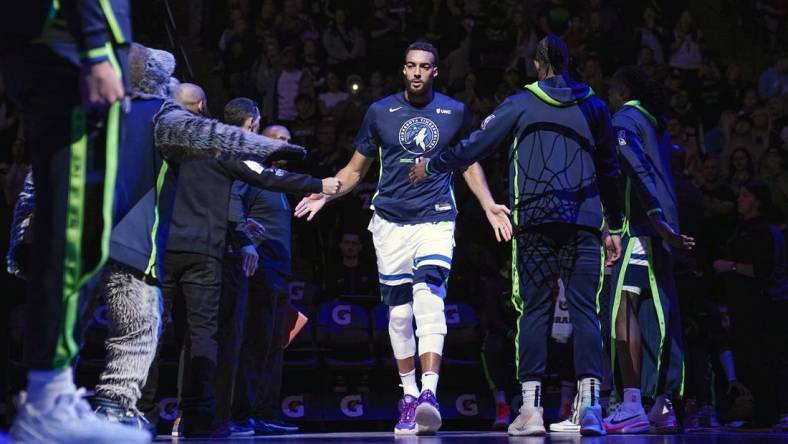 Nov 27, 2022; Minneapolis, Minnesota, USA;   Minnesota Timberwolves center Rudy Gobert (27) is introduced before a game against the Golden State Warriors at Target Center. Mandatory Credit: Nick Wosika-USA TODAY Sports