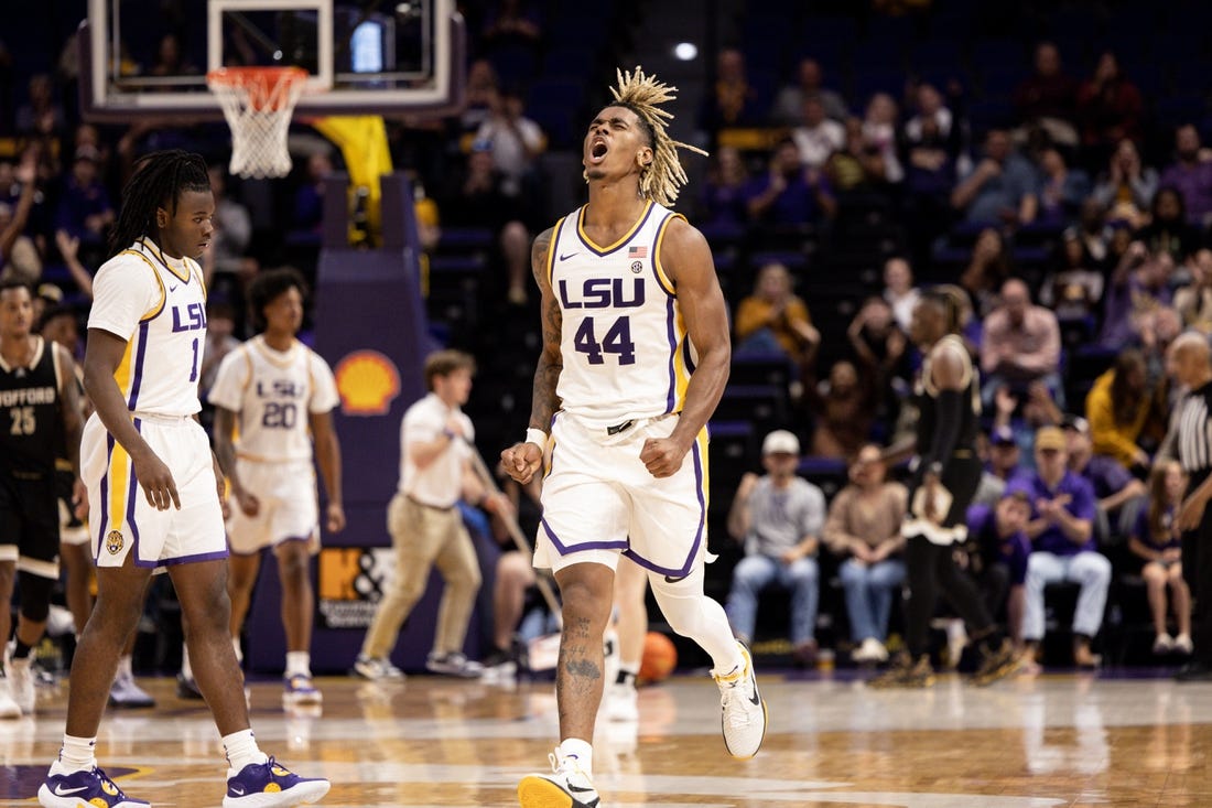 Nov 27, 2022; Baton Rouge, Louisiana, USA;  LSU Tigers guard Adam Miller (44) reacts to making a three point basket in the final minute against the Wofford Terriers during the second half at Pete Maravich Assembly Center. Mandatory Credit: Stephen Lew-USA TODAY Sports