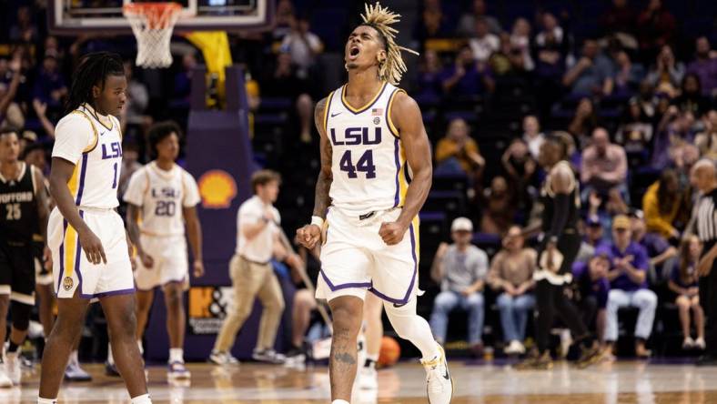 Nov 27, 2022; Baton Rouge, Louisiana, USA;  LSU Tigers guard Adam Miller (44) reacts to making a three point basket in the final minute against the Wofford Terriers during the second half at Pete Maravich Assembly Center. Mandatory Credit: Stephen Lew-USA TODAY Sports