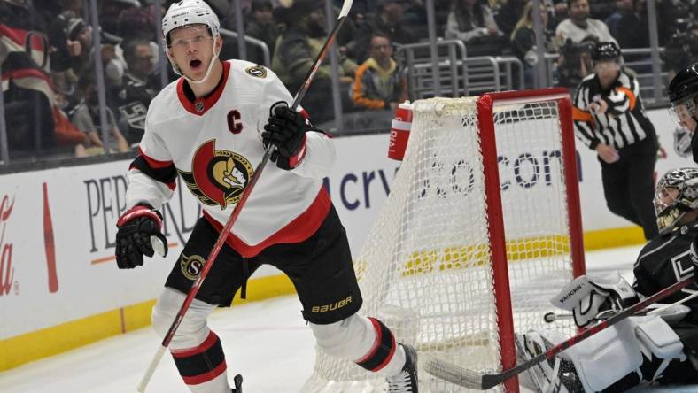 Nov 27, 2022; Los Angeles, California, USA;  Ottawa Senators left wing Brady Tkachuk (7) celebrates after scoring a goal in the first period against the Los Angeles Kings at Crypto.com Arena. Mandatory Credit: Jayne Kamin-Oncea-USA TODAY Sports