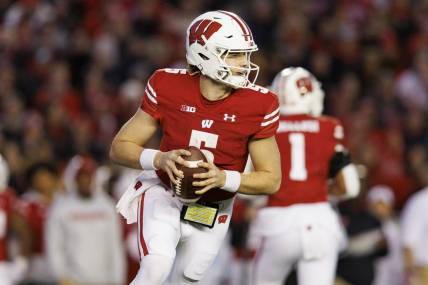 Nov 26, 2022; Madison, Wisconsin, USA;  Wisconsin Badgers quarterback Graham Mertz (5) during the game against the Minnesota Golden Gophers at Camp Randall Stadium. Mandatory Credit: Jeff Hanisch-USA TODAY Sports