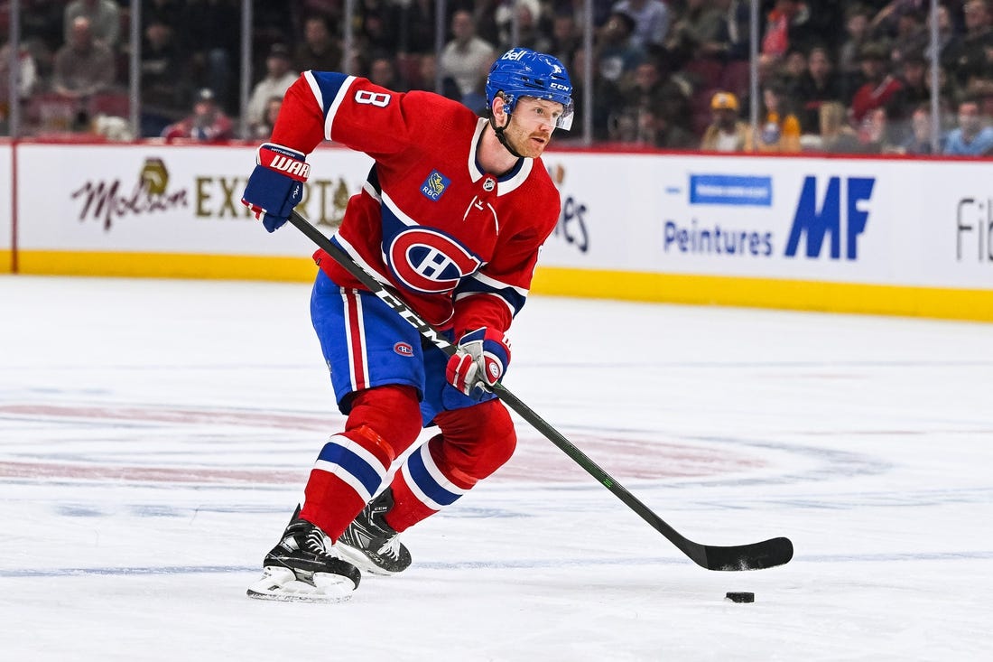 Nov 22, 2022; Montreal, Quebec, CAN; Montreal Canadiens defenseman Mike Matheson (8) plays the puck against the Buffalo Sabres during the first period at Bell Centre. Mandatory Credit: David Kirouac-USA TODAY Sports