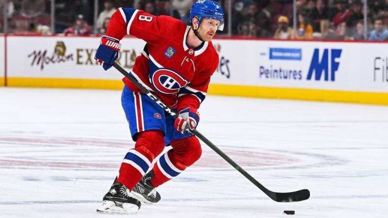 Nov 22, 2022; Montreal, Quebec, CAN; Montreal Canadiens defenseman Mike Matheson (8) plays the puck against the Buffalo Sabres during the first period at Bell Centre. Mandatory Credit: David Kirouac-USA TODAY Sports