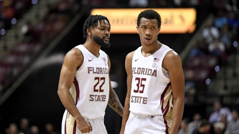 Nov 30, 2022; Tallahassee, Florida, USA; Florida State Seminoles guard Matthew Cleveland (35) and Darin Green Jr. (22) react to a play during the first half against the Purdue Boilermakers at Donald L. Tucker Center. Mandatory Credit: Melina Myers-USA TODAY Sports