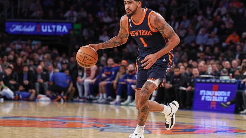 Nov 30, 2022; New York, New York, USA; New York Knicks forward Obi Toppin (1) dribbles during the first half against the Milwaukee Bucks at Madison Square Garden. Mandatory Credit: Vincent Carchietta-USA TODAY Sports