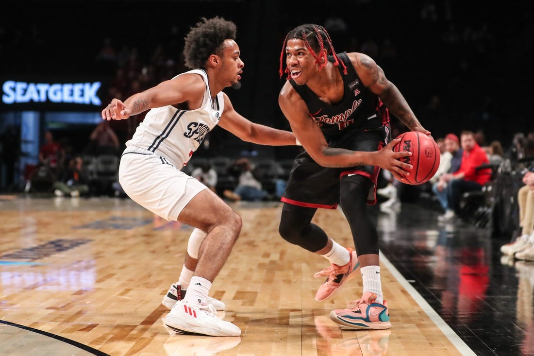 Nov 22, 2022; Brooklyn, New York, USA;  Temple Owls guard Khalif Battle (0) and Richmond Spiders guard Jason Nelson (1) at Barclays Center. Mandatory Credit: Wendell Cruz-USA TODAY Sports