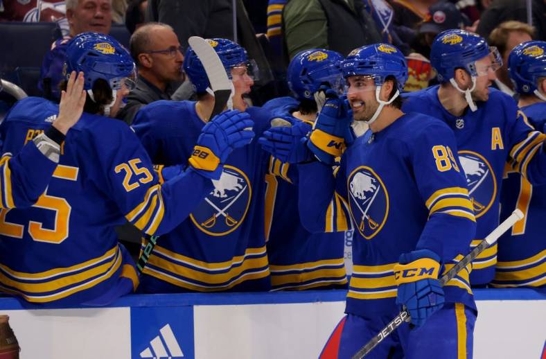 Dec 1, 2022; Buffalo, New York, USA;  Buffalo Sabres right wing Alex Tuch (89) celebrates his goal with teammates during the third period against the Colorado Avalanche at KeyBank Center. Mandatory Credit: Timothy T. Ludwig-USA TODAY Sports