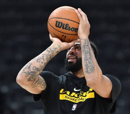 Dec 2, 2022; Milwaukee, Wisconsin, USA; Los Angeles Lakers forward Anthony Davis (3) shoots the ball during pregame warmups at Fiserv Forum. Mandatory Credit: Michael McLoone-USA TODAY Sports