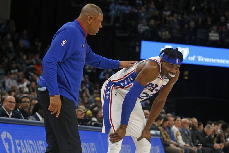 Dec 2, 2022; Memphis, Tennessee, USA; Philadelphia 76ers head coach Doc Rivers (left) talks with Philadelphia 76ers forward Danuel House Jr. (25) after a foul call during the second half at FedExForum. Mandatory Credit: Petre Thomas-USA TODAY Sports