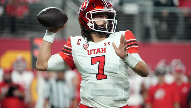 Dec 2, 2022; Las Vegas, NV, USA; Utah Utes quarterback Cameron Rising (7) throws the ball against the Southern California Trojans in the first half of the Pac-12 Championship at Allegiant Stadium. Mandatory Credit: Kirby Lee-USA TODAY Sports