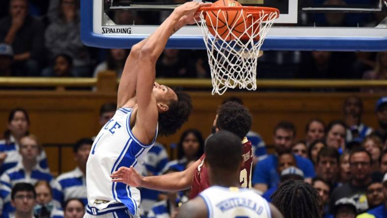 Dec 3, 2022; Durham, North Carolina, USA; Duke Blue Devils center Dereck Lively (1) dunks during the first half against the Boston College Eagles at Cameron Indoor Stadium. Mandatory Credit: Rob Kinnan-USA TODAY Sports