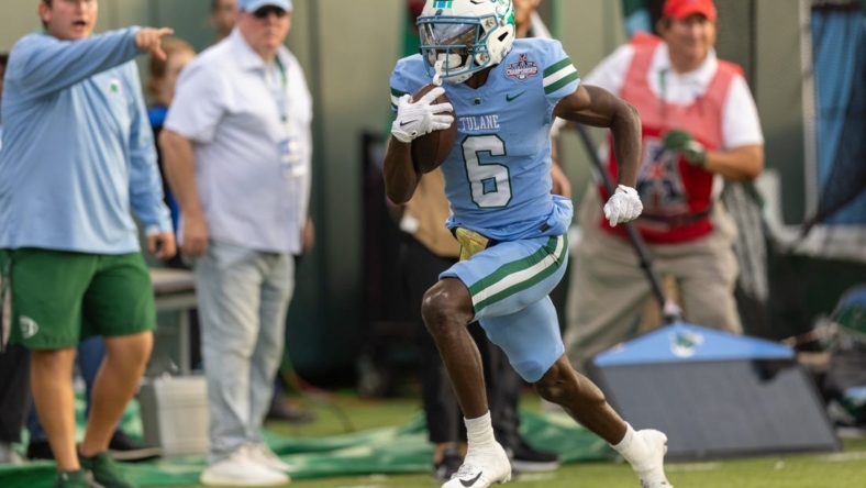 No. 18 Tulane topples No. 22 UCF to claim AAC title