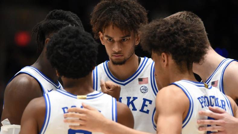 Dec 3, 2022; Durham, North Carolina, USA; Duke Blue Devils center Dereck Lively (center) and other starters huddle prior to a game against the Boston College Eagles at Cameron Indoor Stadium. Mandatory Credit: Rob Kinnan-USA TODAY Sports