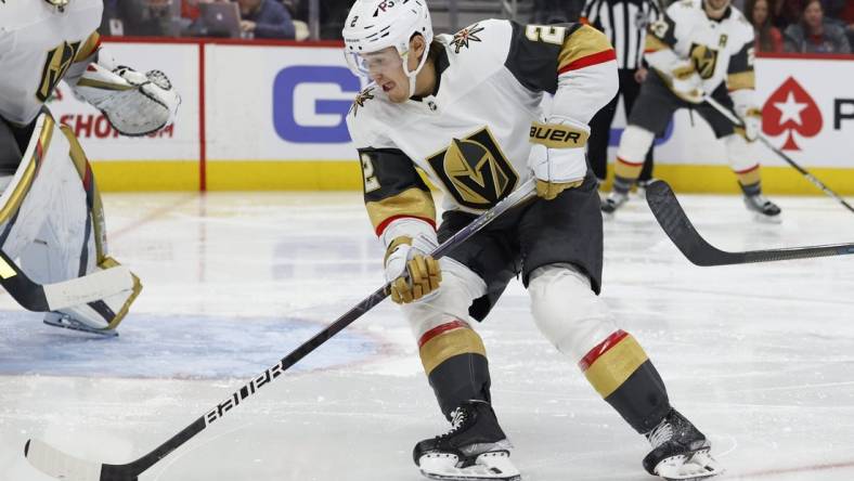 Dec 3, 2022; Detroit, Michigan, USA;  Vegas Golden Knights defenseman Zach Whitecloud (2) skates with the puck against the Detroit Red Wings in the second period at Little Caesars Arena. Mandatory Credit: Rick Osentoski-USA TODAY Sports