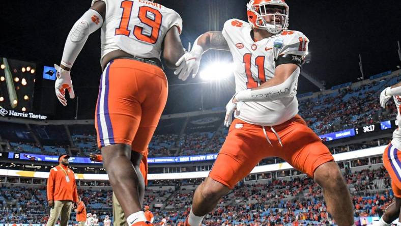 Dec 3, 2022; Charlotte, NC, USA; Clemson Tigers defensive lineman Bryan Bresee (11) warms up with defensive lineman DeMonte Capehart (19)  before the ACC Championship game against the North Carolina Tar Heels at Bank of America Stadium. Mandatory Credit: Ken Ruinard-USA TODAY NETWORK