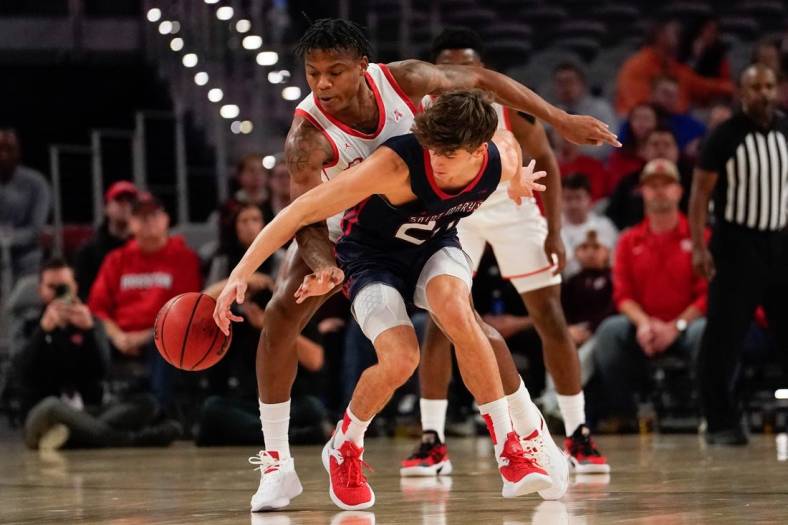 Dec 3, 2022; Fort Worth, Texas, USA;  St. Mary's Gaels guard Aidan Mahaney (20) has the ball stolen by Houston Cougars guard Marcus Sasser (0) during the first half at Dickies Arena. Mandatory Credit: Chris Jones-USA TODAY Sports