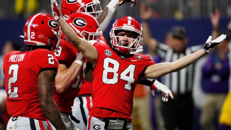 Georgia wide receiver Ladd McConkey (84) celebrates after scoring a touchdown during the first half of the SEC Championship NCAA college football game between LSU and Georgia in Atlanta, on Saturday, Dec. 3, 2022.

News Joshua L Jones

Syndication Online Athens