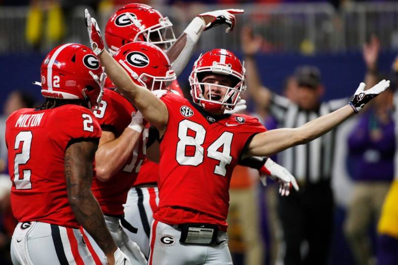 Georgia wide receiver Ladd McConkey (84) celebrates after scoring a touchdown during the first half of the SEC Championship NCAA college football game between LSU and Georgia in Atlanta, on Saturday, Dec. 3, 2022.

News Joshua L Jones

Syndication Online Athens