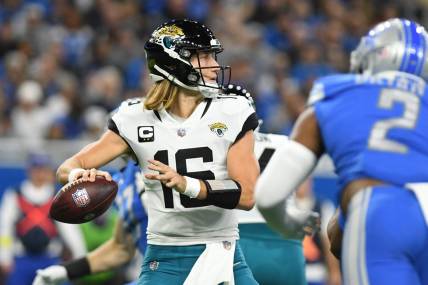 Dec 4, 2022; Detroit, Michigan, USA; Jacksonville Jaguars quarterback Trevor Lawrence (16) throws a pass against the Detroit Lions in the second quarter at Ford Field. Mandatory Credit: Lon Horwedel-USA TODAY Sports