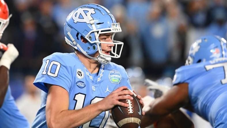 Dec 3, 2022; Charlotte, North Carolina, USA;  North Carolina Tar Heels quarterback Drake Maye (10) passes the ball in the first quarter at Bank of America Stadium. Mandatory Credit: Bob Donnan-USA TODAY Sports