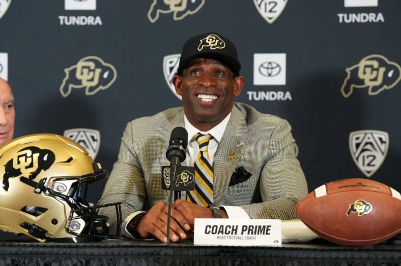 Dec 4, 2022; Boulder, CO, USA; Colorado Buffaloes head coach Deion Sanders speaks during a press conference at the Arrow Touchdown Club. Mandatory Credit: Ron Chenoy-USA TODAY Sports